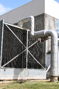 Image of an industrial cooling tower for an office building